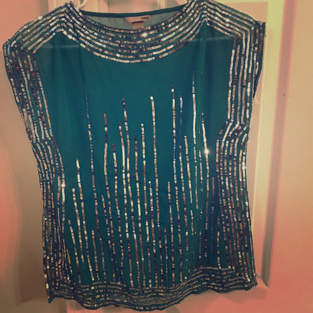 Sequined green top